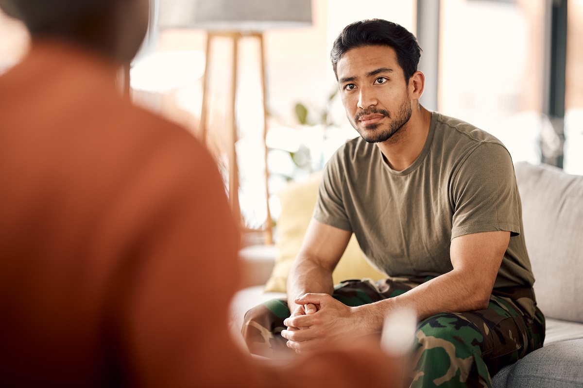 Man uses his HSA benefits for mental health by seeking help from a trained counselor.